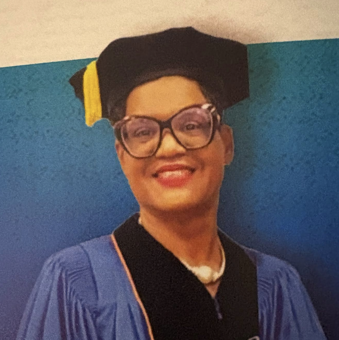 Dr. Lucretia Mason-Underdue in doctoral regalia